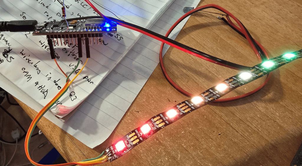 ESP8266 running at 160Mhz and powering WS2812B LED strip at 5V.